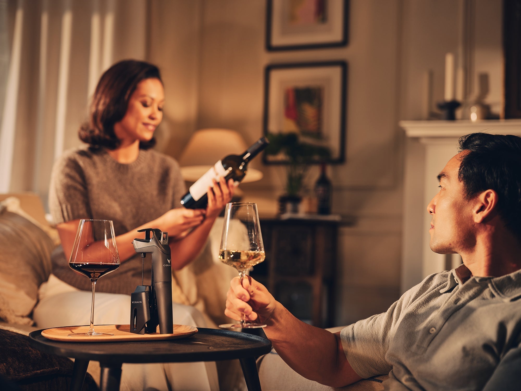 two people enjoying red and white wine with Coravin